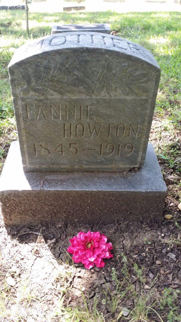 photograph cemetery headstones flowers