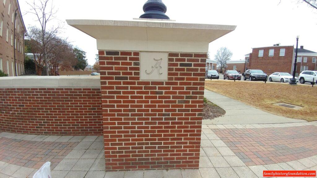 Crimson Tide logo in brick pillar